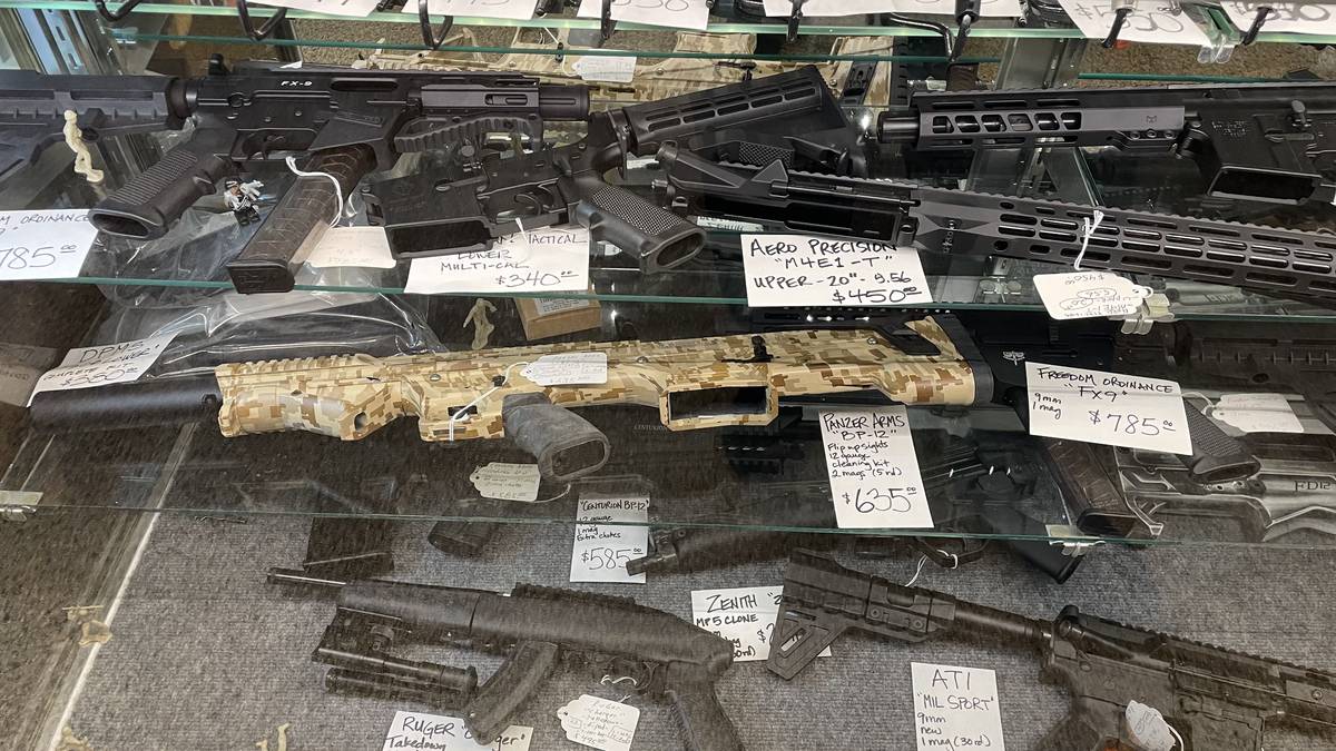 AR-15 builds and tactical shotguns: DPMS lower complete kit, Aero Precision M4E1-T 20-inch 5.56 upper, Centurion BP-12 12-gauge semi-auto, Panzer Arms BP-12 in desert digital camo, and Freedom Ordnance FX-9 9mm carbine.