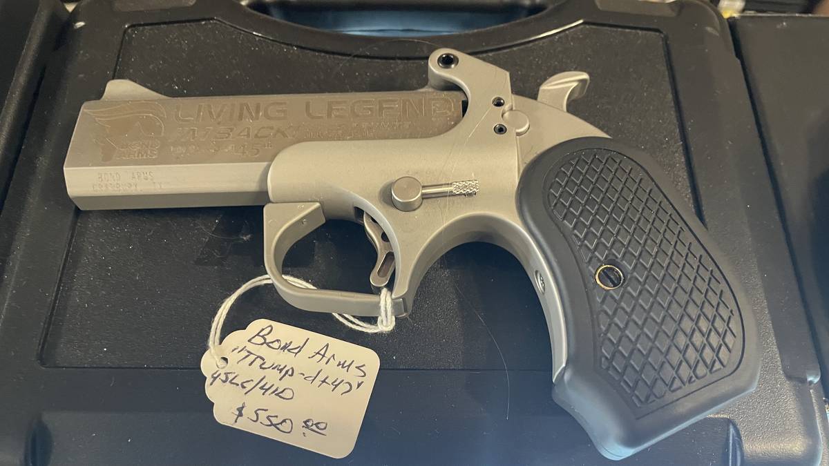 Bond Arms Trump 47 Living Legend derringer in .45 LC and .410 gauge, two-shot stainless finish.