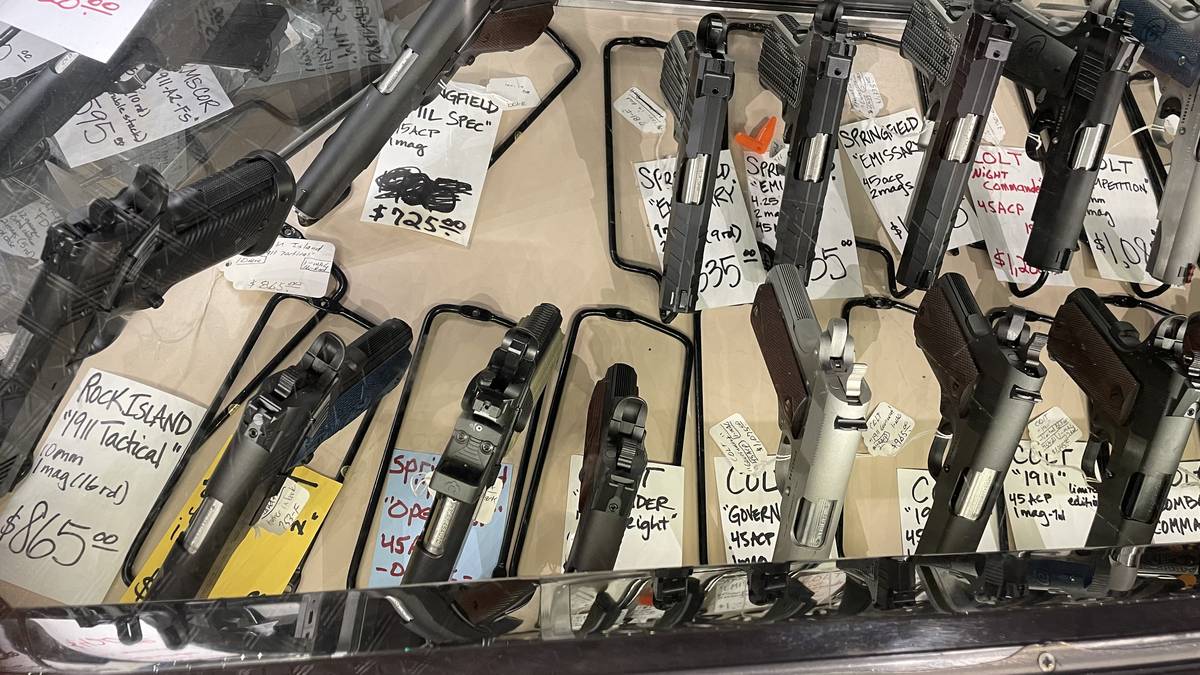 High-end 1911 pistol case featuring Rock Island 1911 Tactical 10mm, Springfield Mil-Spec and Emissary, Colt Night Commander, Colt Government, and Colt Combat Commander in .45 ACP.